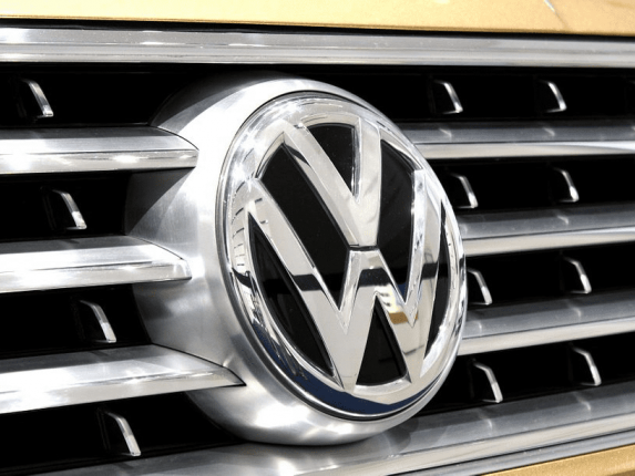 Closeup of a Volkswagen symbol on a cars front grille